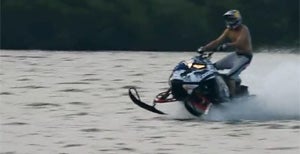 Snowmobiles Skipping Water 38