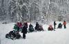 Ontario Snowmobilers Checking Mobile Trail Guide
