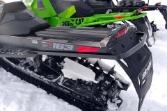 The Ski-Doo Summit SP, with its micro-channel cooling system in the tunnel, thaws and freezes snow which in turns adds weight to the mountain snowmobile as the day wears on.