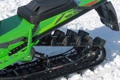 Deep three inch lugs, or 2.6-inch lugs from the PowerClaw track gives the MC 8000 momentum to climb high and go deep. Note the open hyfax rails.  Note the standard tunnel bag.