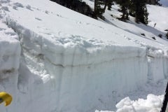 A snow stability test cut into a slope reveals where a slope is most likely to slide.