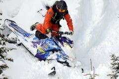 Veteran RRS guide, Aaron Roesler, begins swinging his right leg to the left board in anticipation to a possible wrong foot forward descent. Reading the terrain is crucial on bumpy descents. Note the low bars on the G4.