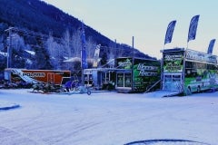 As the sun tries to peek over Snow King Mountain, the many race begin unloading their snowmobiles on Saturday morning.