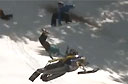 Snowboarder Jumps Over Snowmobiler [video]