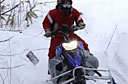 Laptop Dragged Behind Snowmobile to Test Toughness [video]