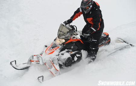 With its 144-inch Camoplast Maverick track the MTX is at home in deep powder.