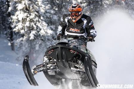 Kyle Tapio screams up the Mountain on his highly modified Arctic Cat M8.