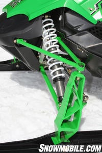 The AWS VIII suspension uses an extruded aluminum spindle for lightweight and great strength. The upper A-arm uses a ball joint end which differs from the bolt and bushing joint on the AWS VII.