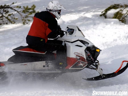 Ski-Doo’s REV models create a perception of a short sled, but note the ample track length behind the rider.