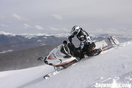 The M1000 is is a pleasure to ride in the steep and deep backcountry with a chassis that makes it easy to sidehill.  