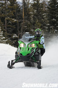 With good bite in the corners, the Arctic Cat F570 challenges more powerful sleds in the twisties.