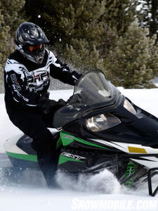 Test rider Doug Erickson hits the throttle and easily pushes the 2011 F8 EXT through powder.