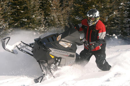 Back for 2011 is the Protaper aluminum handlebar. The hand-warmer controls are off the handlebar down by the gas cap.