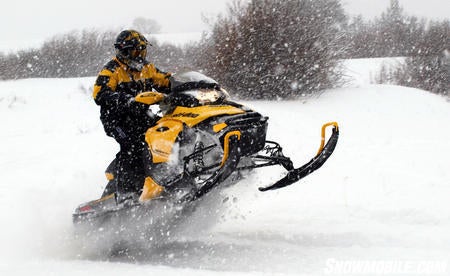 2013 Ski-Doo MXZ TNT 800 E-TEC tailstand in snowstorm