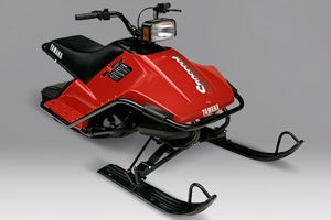 Taking a risk, Yamaha created a low cost, 79cc snow scooter that is more popular now as a vintage sled than it was when it was first introduced in 1988. Taking a risk, Yamaha created a low cost, 79cc snow scooter that is more popular now as a vintage sled than it was when it was first introduced in 1988.