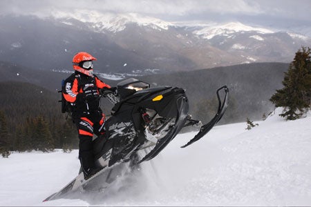 The Summit X 800 shows off its tail walking capabilities in the Colorado powder.