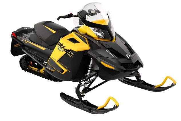 To accommodate the extra width of the three cylinder 4-Tec 1200 Rotax engine, Ski-Doo uses the wider REV-XR platform for this version of its MXZ TNT. Ski-Doo MXZ TNT 1200 4-TEC