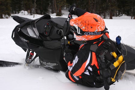 Ski-doo engineer Chris Ruske breaks it loose on an 800 Summit X.  Ski-Doo continues its quest to improve the REV XP chassis.