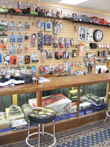 The parts counter gets to be a busy place to 'talk' snowmobiling during the season.