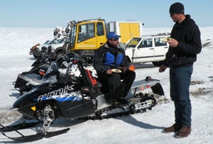 Crewmembers take a break from winter training for a quick on-location lunch.