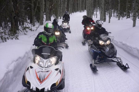 The crews get out on the trail for a real “hands on” snowmobile session.