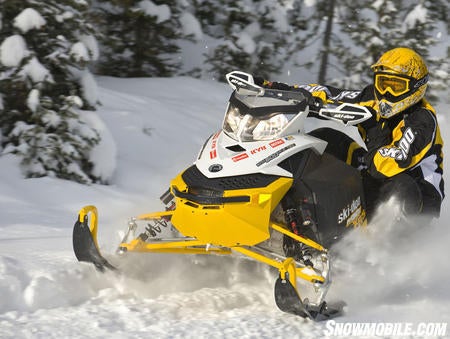 Ski-Doo's MX Z X-RS is designed for optimum ditch banging and deep corner cutting. Its over-the-motor steering post is designed for driver and snowmobile stability - keeping the vehicle flat. Unlike Cat's Sno Pro line, the MX Z X-RS steering post is shared with the XP Summit, though adapted for mountain use, the concept is the same.