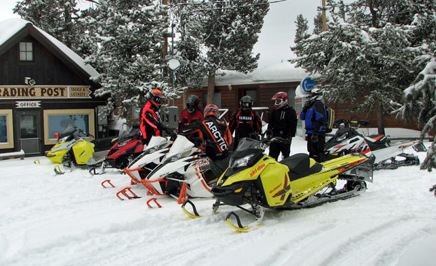 Snowmobilers Wearing Helmets