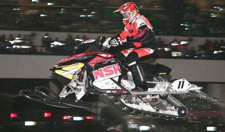 Tim Tremblay flies over the front straight double jump in the ISOC National Pro Open final at Canterbury Park.