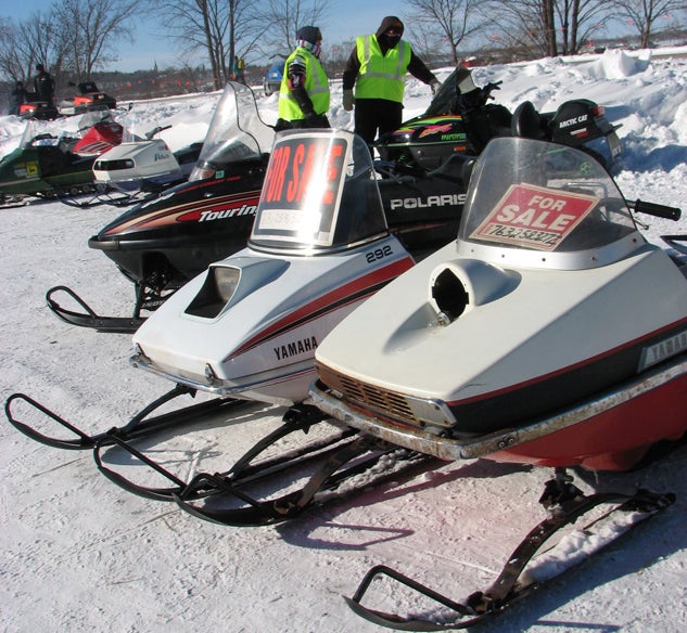 You can find old sleds to fix up at many snowmobile events like the annual Waconia swap meet in Minnesota. Buying a Used Snowmobile