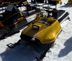 When this Ski-Doo was new there were orange versions bearing the Moto-Ski brand name. Vintage Ski-Doo TNT RV