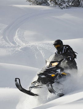 Ski-Doo’s lightweight REV–XP chassis puts the Summit on top of the snow.