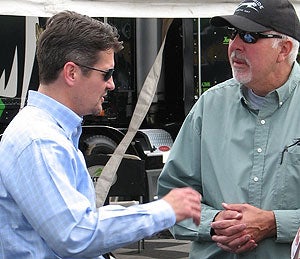 Four-time Tesoro Iron Dog race winner and Alaska’s 'First Dude', Todd Palin (at left) chats with Arctic Cat district sales manger Scott Eilertson at Minnesota’s Hay Days event.