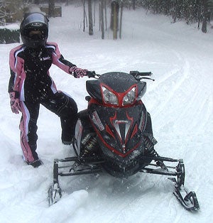 Chris Bell of Enforcer snowmobiles wants this season to be one of introducing his fully-featured but down-sized line of models. Chris Bell of Enforcer snowmobiles wants this season to be one of introducing his fully-featured but down-sized line of models.